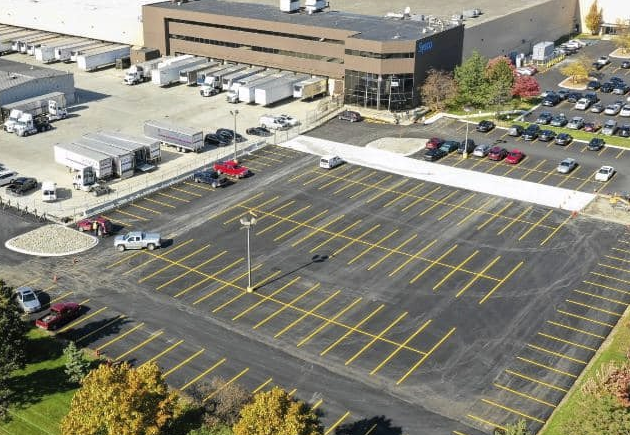 overhead shot of parking lot, newly paved